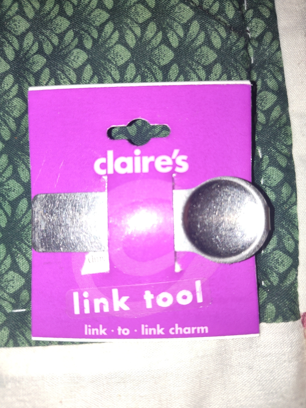 Claire's Silver Round Link Too Charm on Purple Card